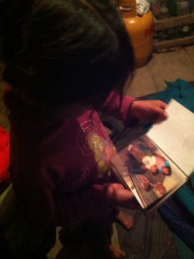 One of the daughters showing me the family albums